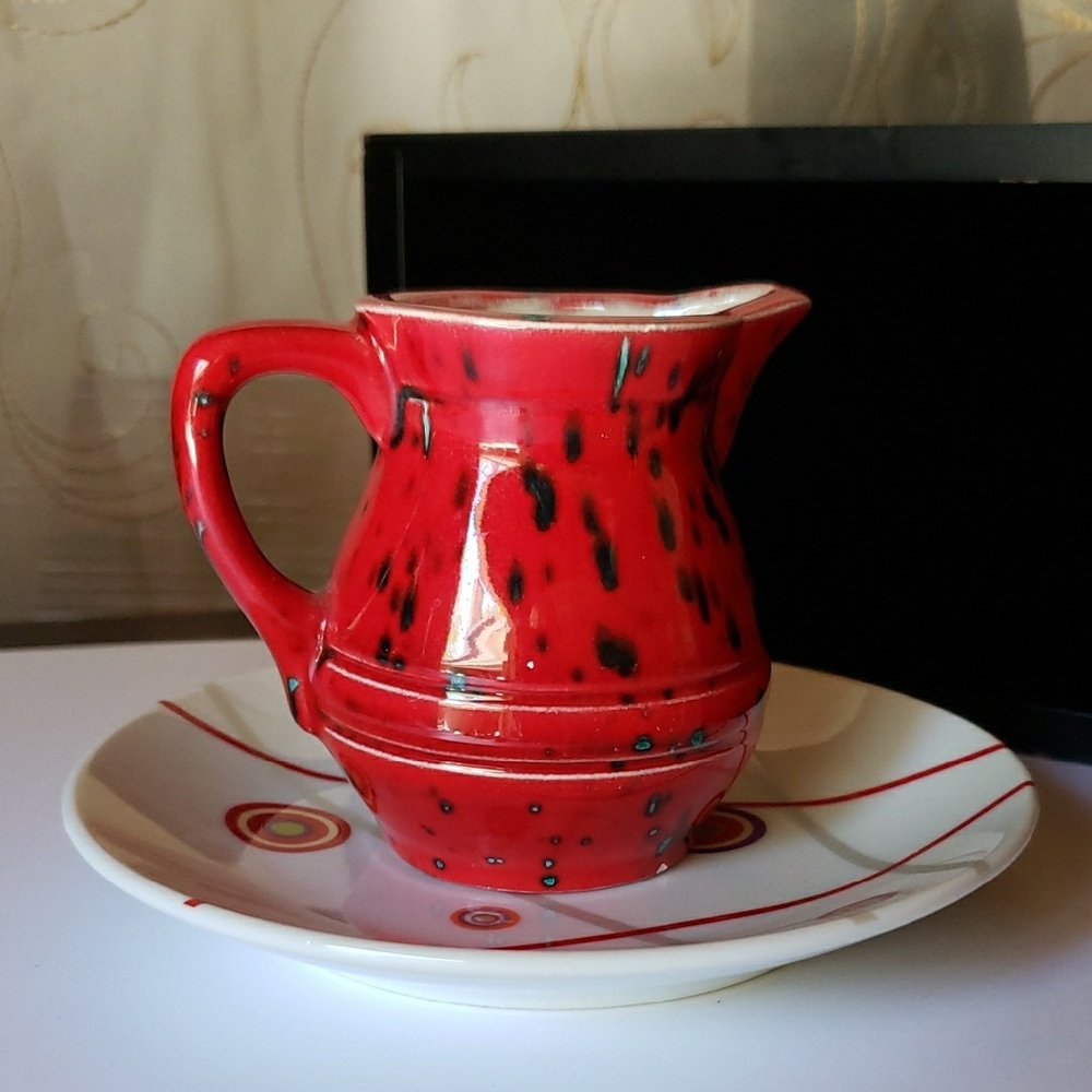 Vibrant Red Ceramic Art Pitcher with Saucer